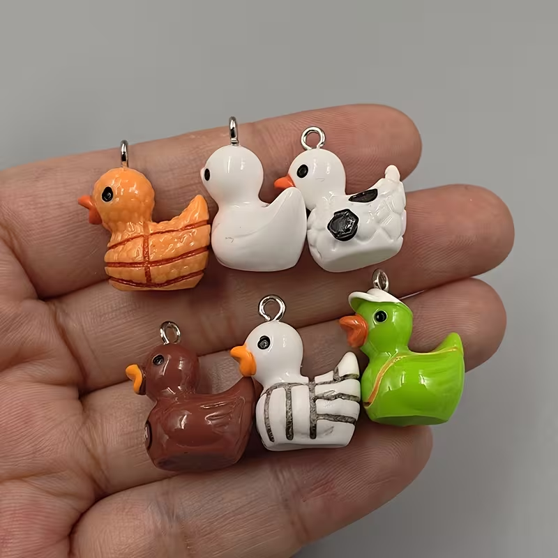 10pcs Cute Sports Duck Charms, - Resin Crafts Diy recensie en prijs